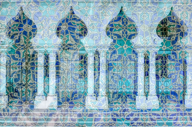 A layered image of a house entrance steps and pillars seen through a decorative blue mosaic in Kuala Lumpur Malaysia. Fine art photography by Päivi Maria Wells.