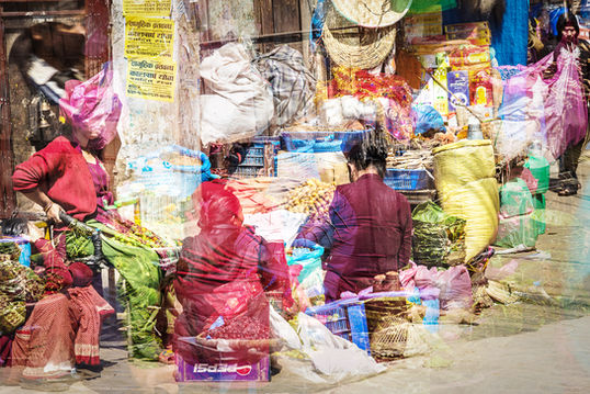 Abstract wall art of women sitting and talking at the market in Kathmandu. Fine art prints and photography in Nepal by Päivi Maria Wells.