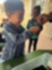 Felipe & Jacie smiling big w_worms (1).jpg