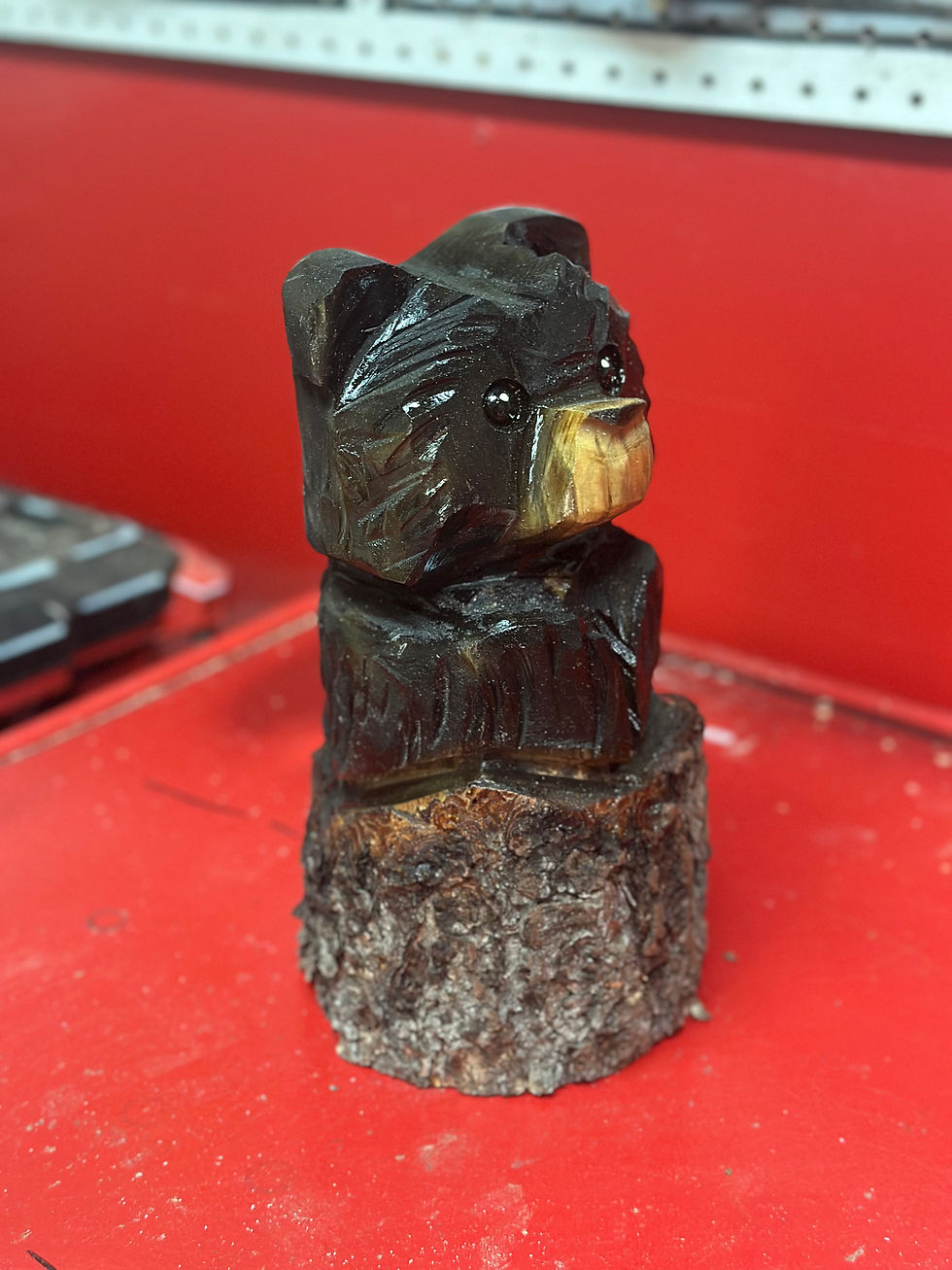 Thumbnail: 10” Stump Bear Chainsaw Carving by Kyra Waits