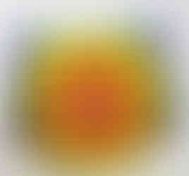 A square lattice dish made from glass in rainbow of colours including blue, green, orange, yellow and red