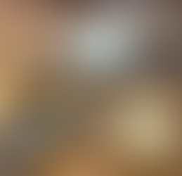 3 candleholders two in swirl designs with dark brown and cream clear., one glazed in white.