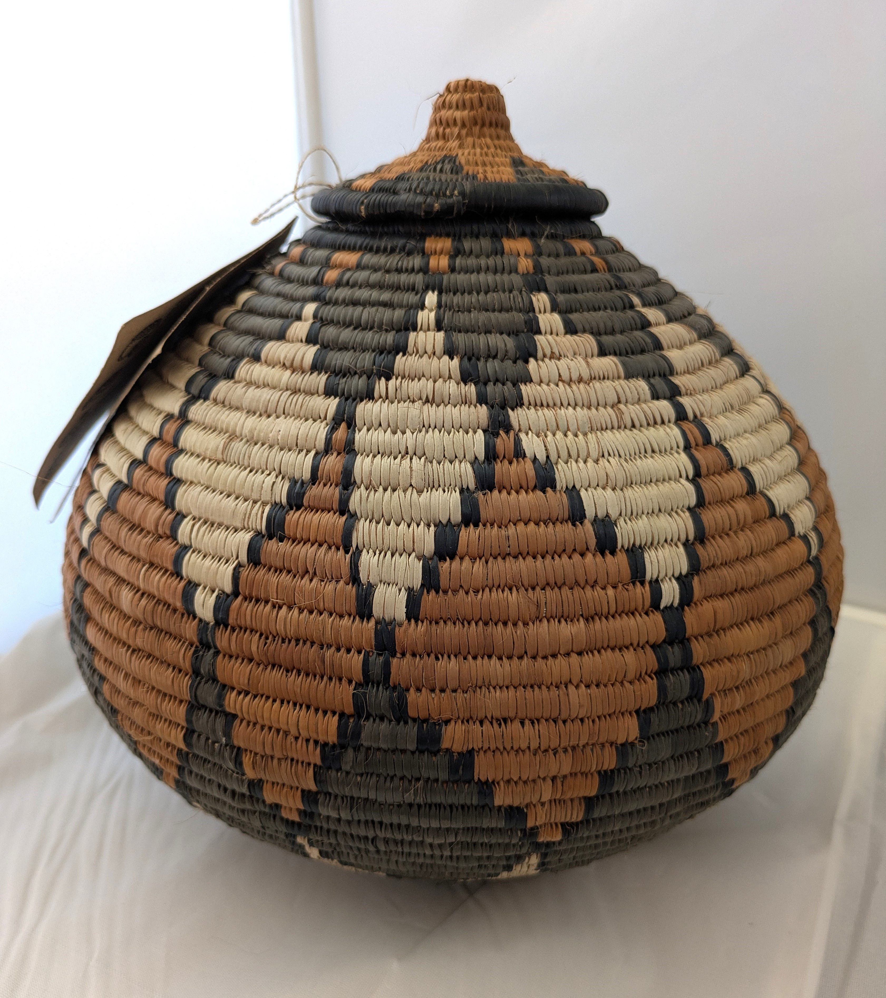 traditional Zulu hand woven basket with lid