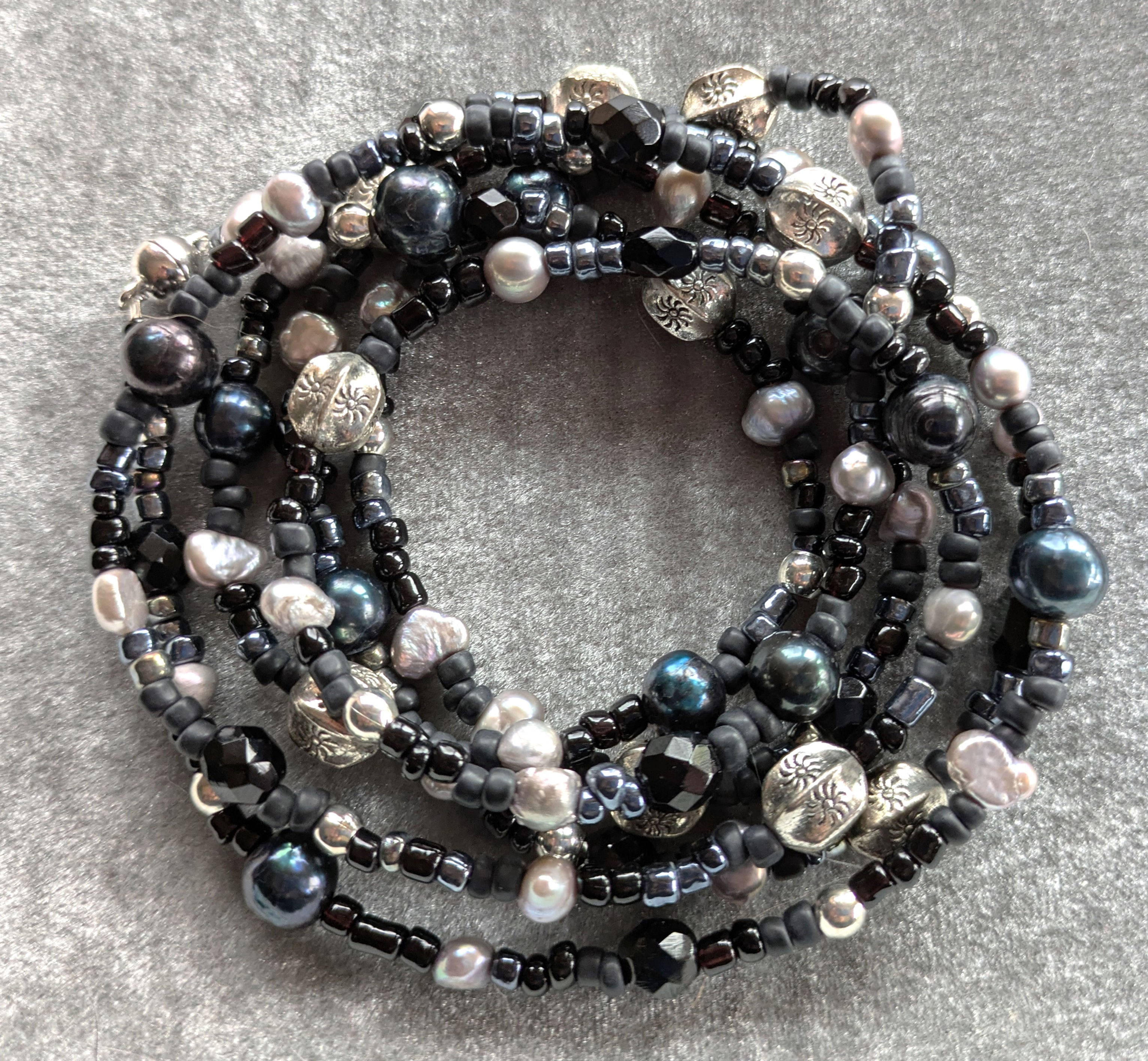 54" wrap bracelet created from black and cream pearls and beads