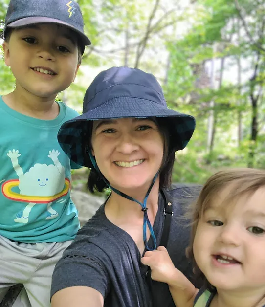 Andrea with kids.webp