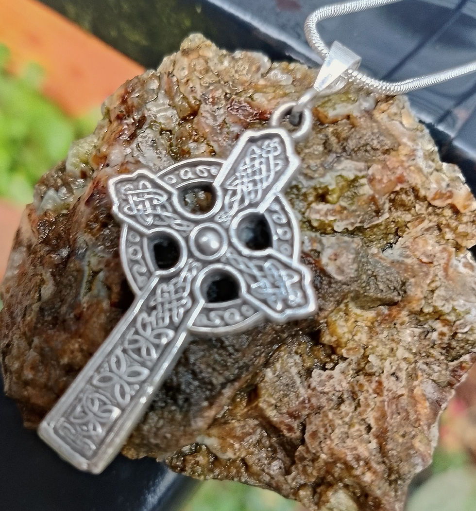 Silver Celtic cross necklace with intricate knotwork
