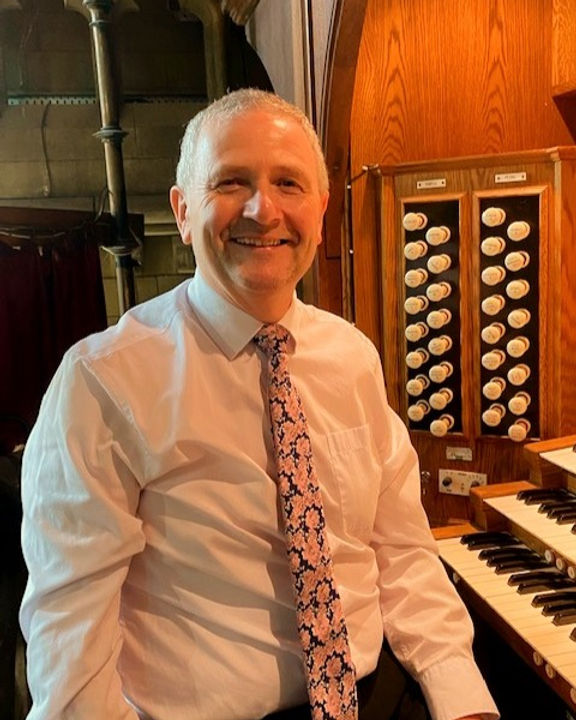 Keith at the organ_edited_edited.jpg