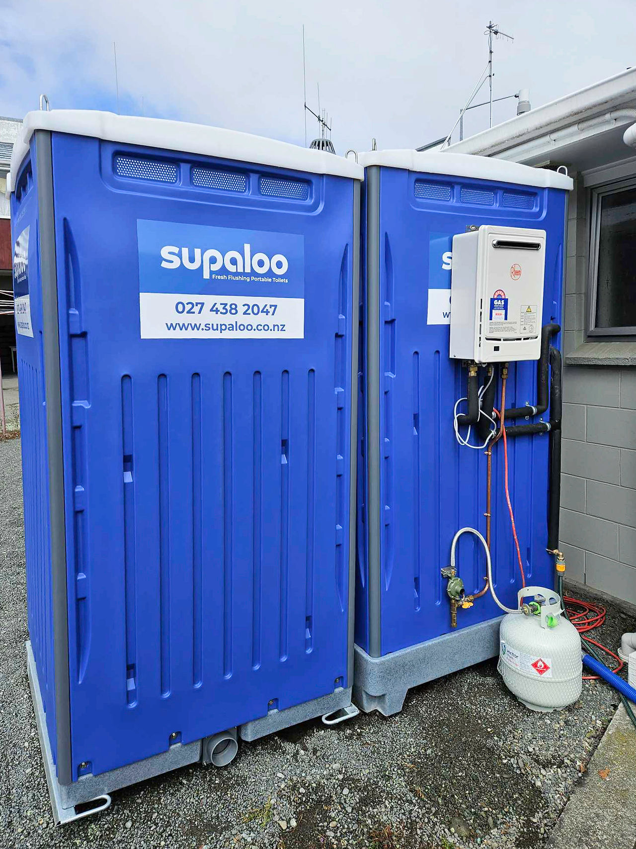 Rear of portable shower unit, showing califont unit