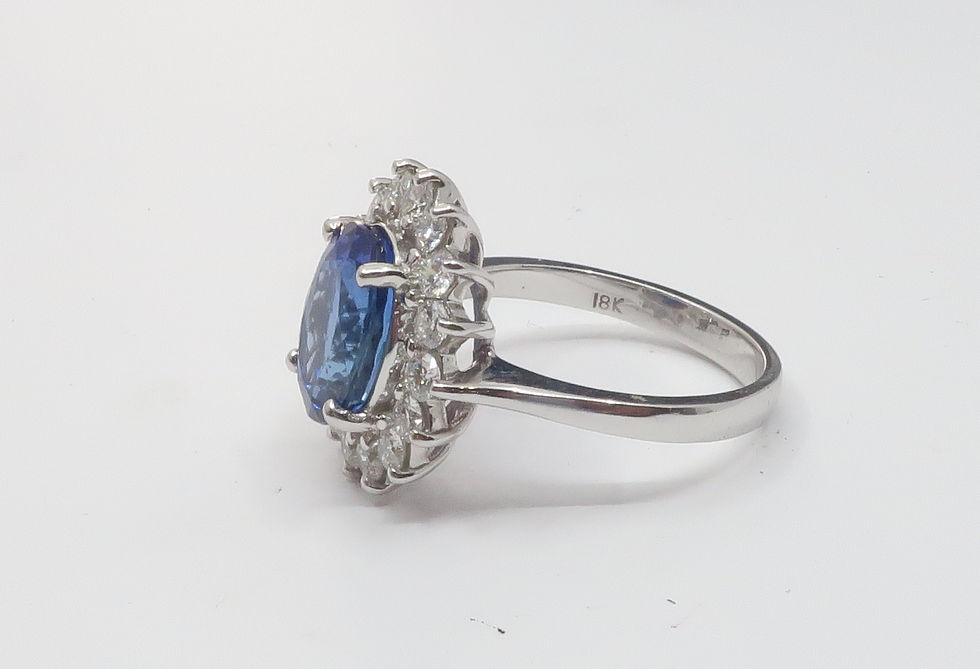 Thumbnail: Ladies Halo Design Diamond and Tanzanite Ring