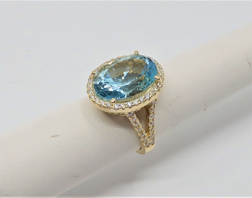Thumbnail: Ladies Halo Design Aquamarine  and Diamond Ring in 14karat Yellow Gold