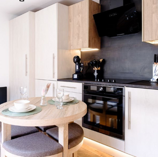 Modern kitchen with dining table and chairs