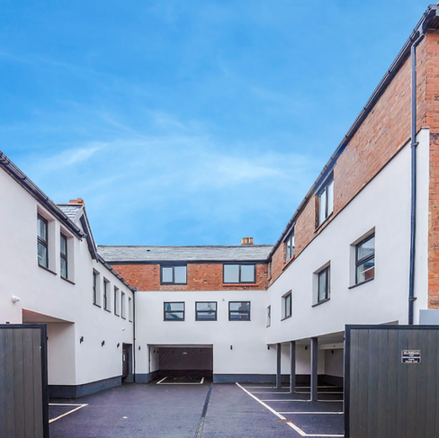 Modern apartment courtyard with parking