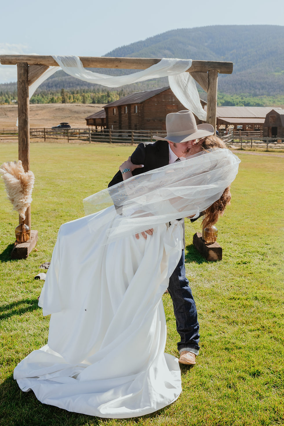 Bride and groom's first kiss in crested butte 