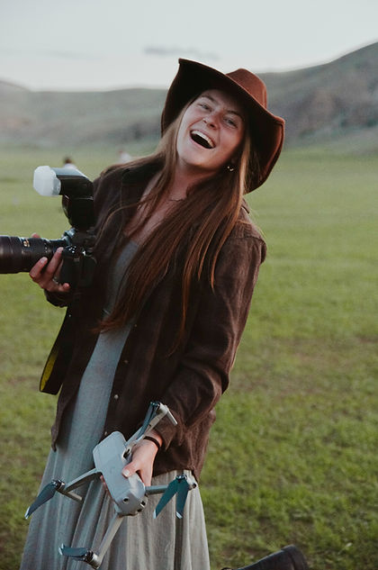 crested butte photographer jacey smiling with her camera