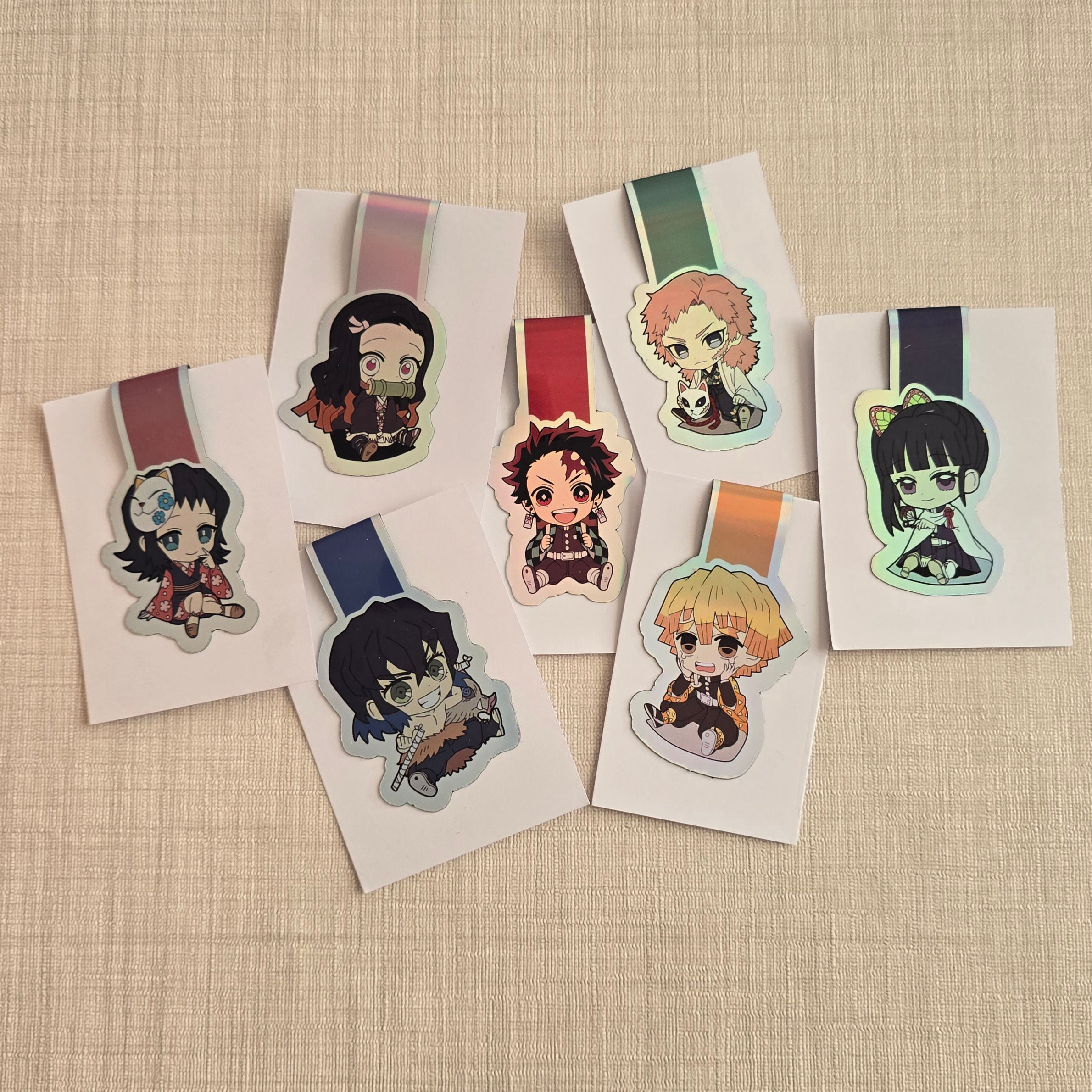 🔥 Marcapáginas imantados holográficos · Demon Slayer – Colección Aprendices