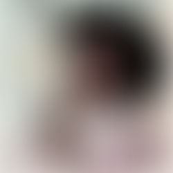 Black woman whispering into the void