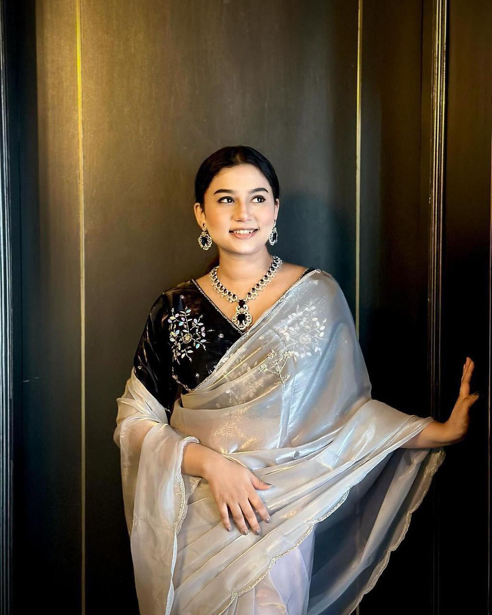 Thumbnail: Glass Silk Saree with All Over Handwork