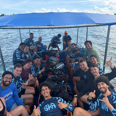 divers on a boat community