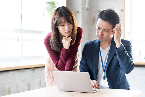 young asian businessperson working in office.jpg