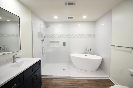 Onyx
Collection manufacturer photo of a bathroom with a walk-in shower and freestanding tub. Product example, not a Bath Crafters job.