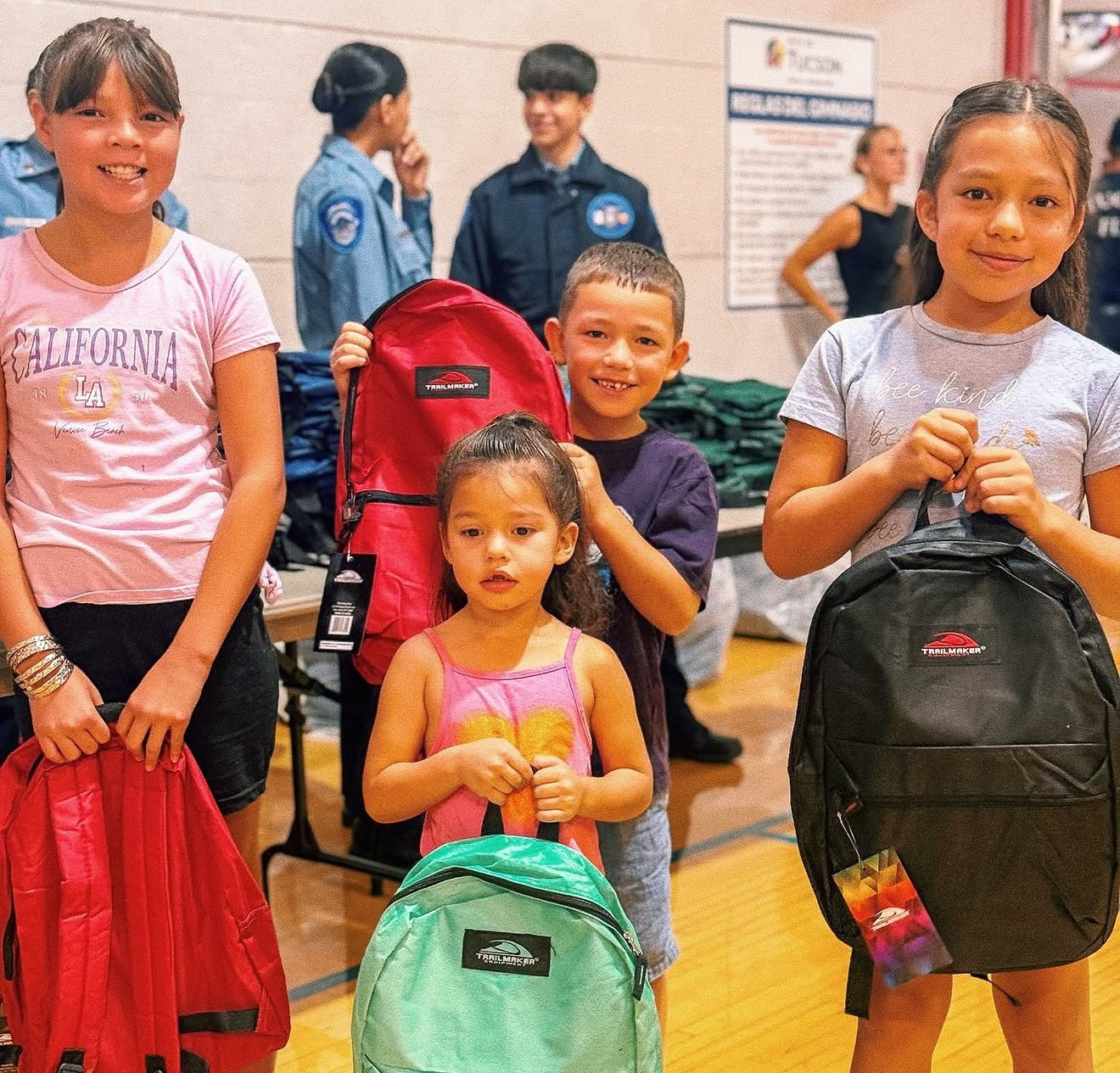 Free backpacks, school supplies, and community resources available through neighborhood pickup sites and back-to-school events across Tucson