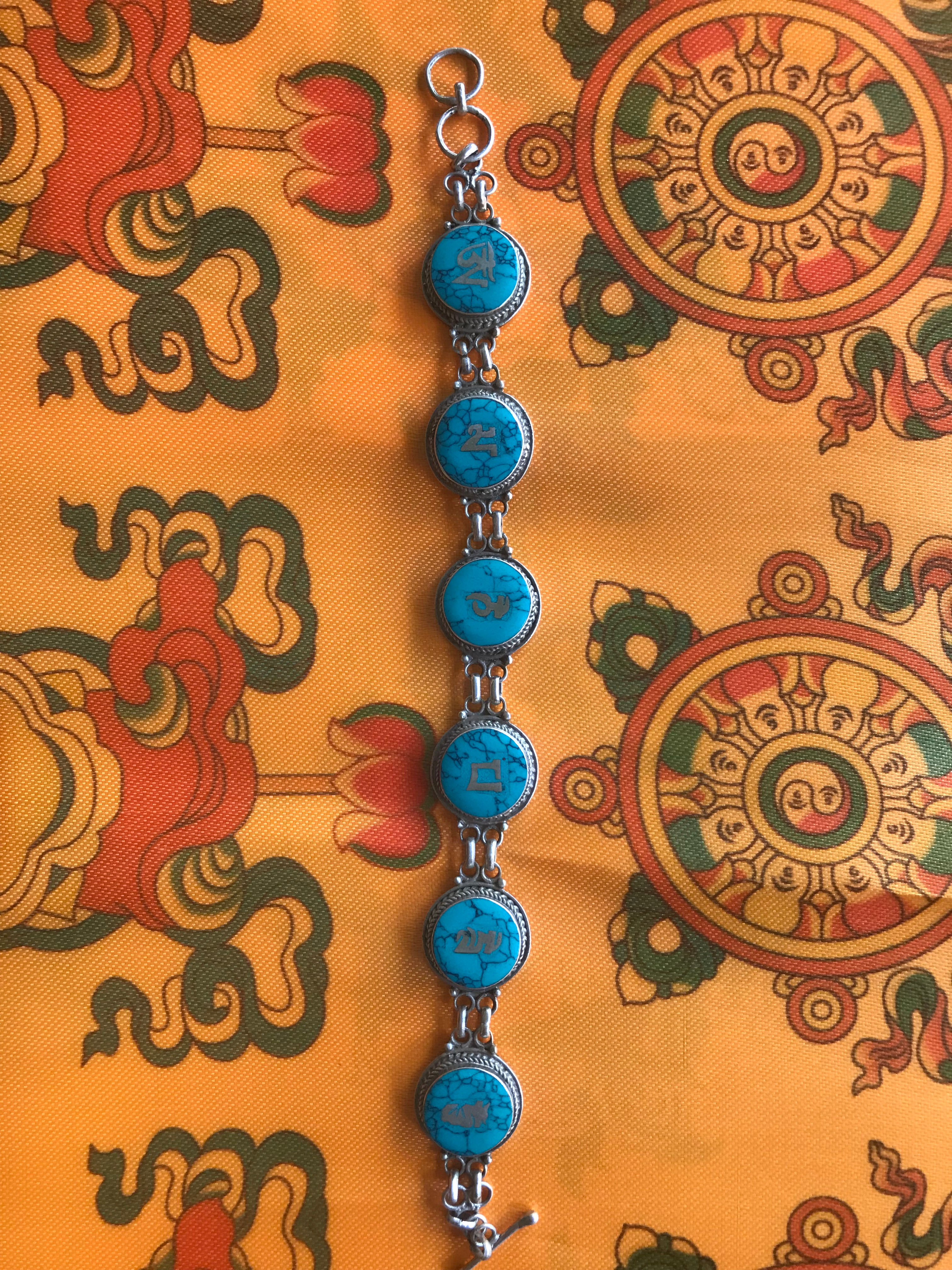 Bracelet en argent massif avec incrustation de turquoise