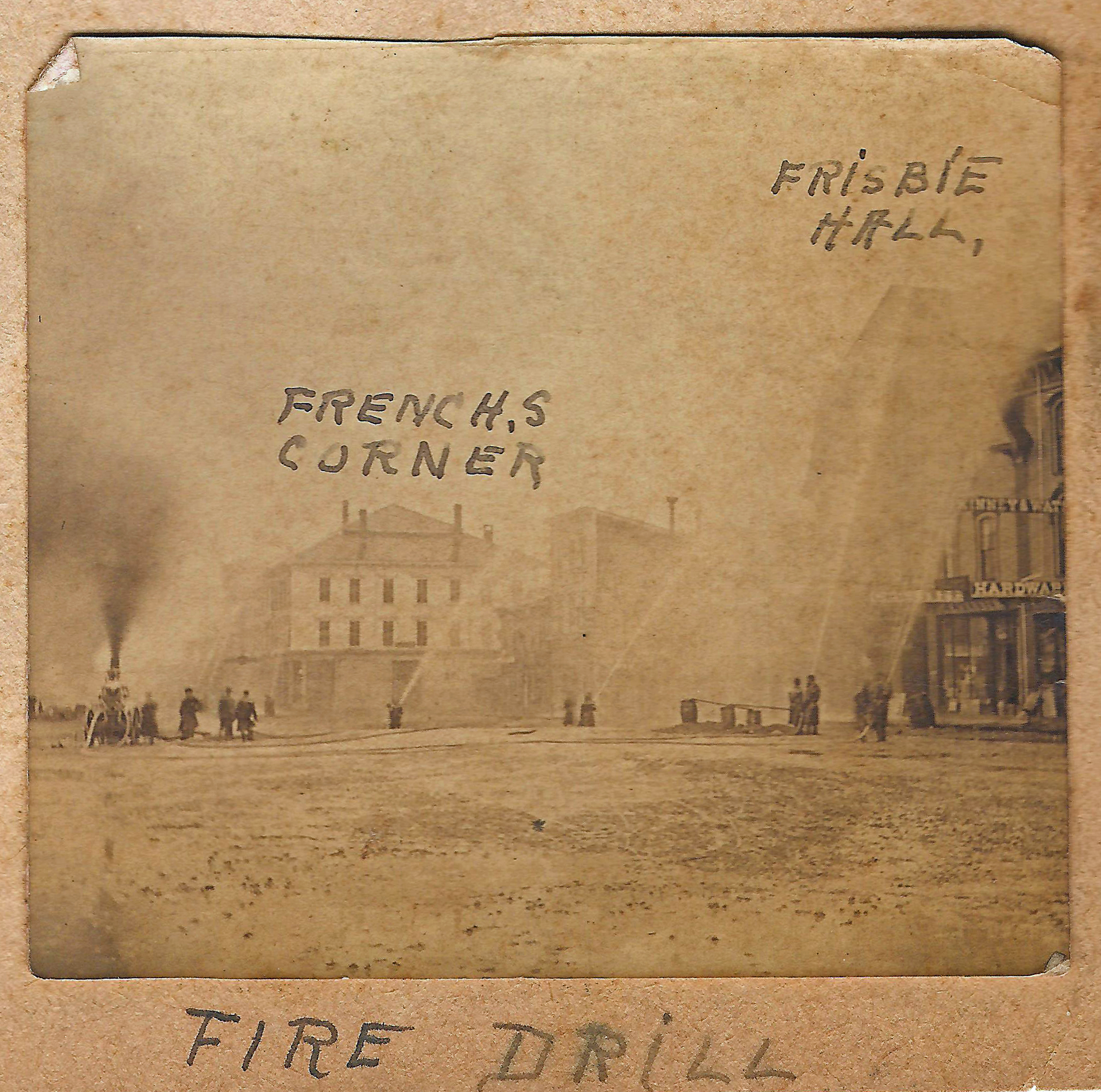 Fire drill with the Sockanossett pumper in Market Square, Houlton, ca. 1880.