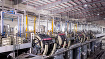 Close-up of rows of industrial tanning drums
