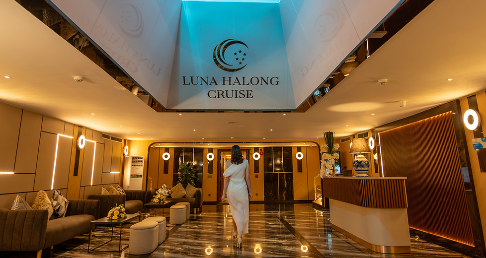Luna Cruise reception wide shot with elegant woman walking from the back