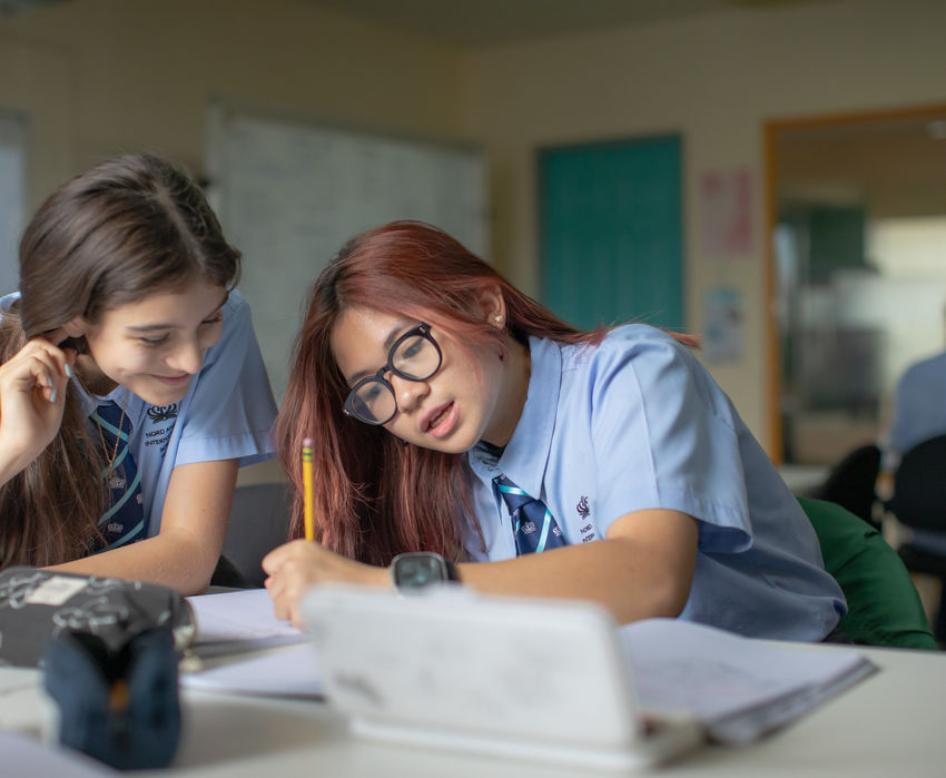 Students writing in class