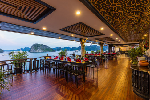 open air restaurant tables on a cruise boat