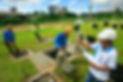 workers with hard hats inspecting water or sediment form conical containers, with open hatches around them - By Danilo Victoriano - sewage treatment - Marikina city Philippines - WIN photo competition