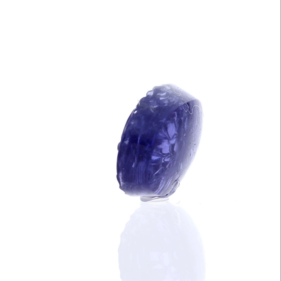 Thumbnail: Tanzanite Oval Cab Carving