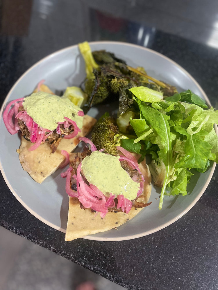 Sweet PotatoBlack Bean Patties with Quickpickled Onions and Tahini