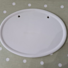 Oval name plaque