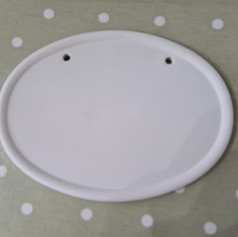 Oval door plaque
