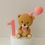 Thumbnail: Fondant teddy bear with pink balloon and personalised number cake topper decoration set
