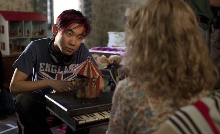 James Wan on the set of the first The Conjuring film.