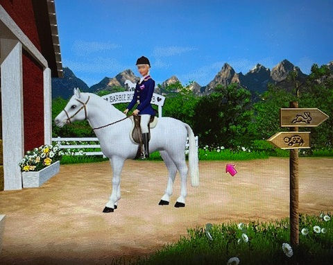 Screenshot of Barbie Riding Club for PC. Barbie in riding gear atop a white horse.
