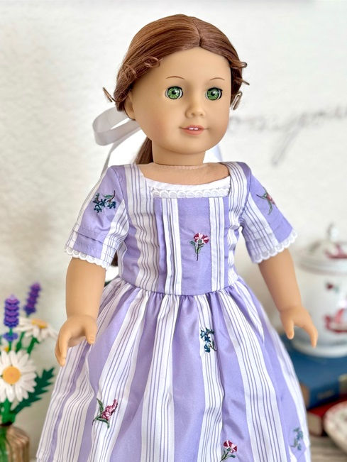 Another view of restored Felicity in her purple traveling gown.