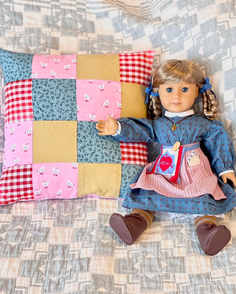 The patchwork side of the pillow