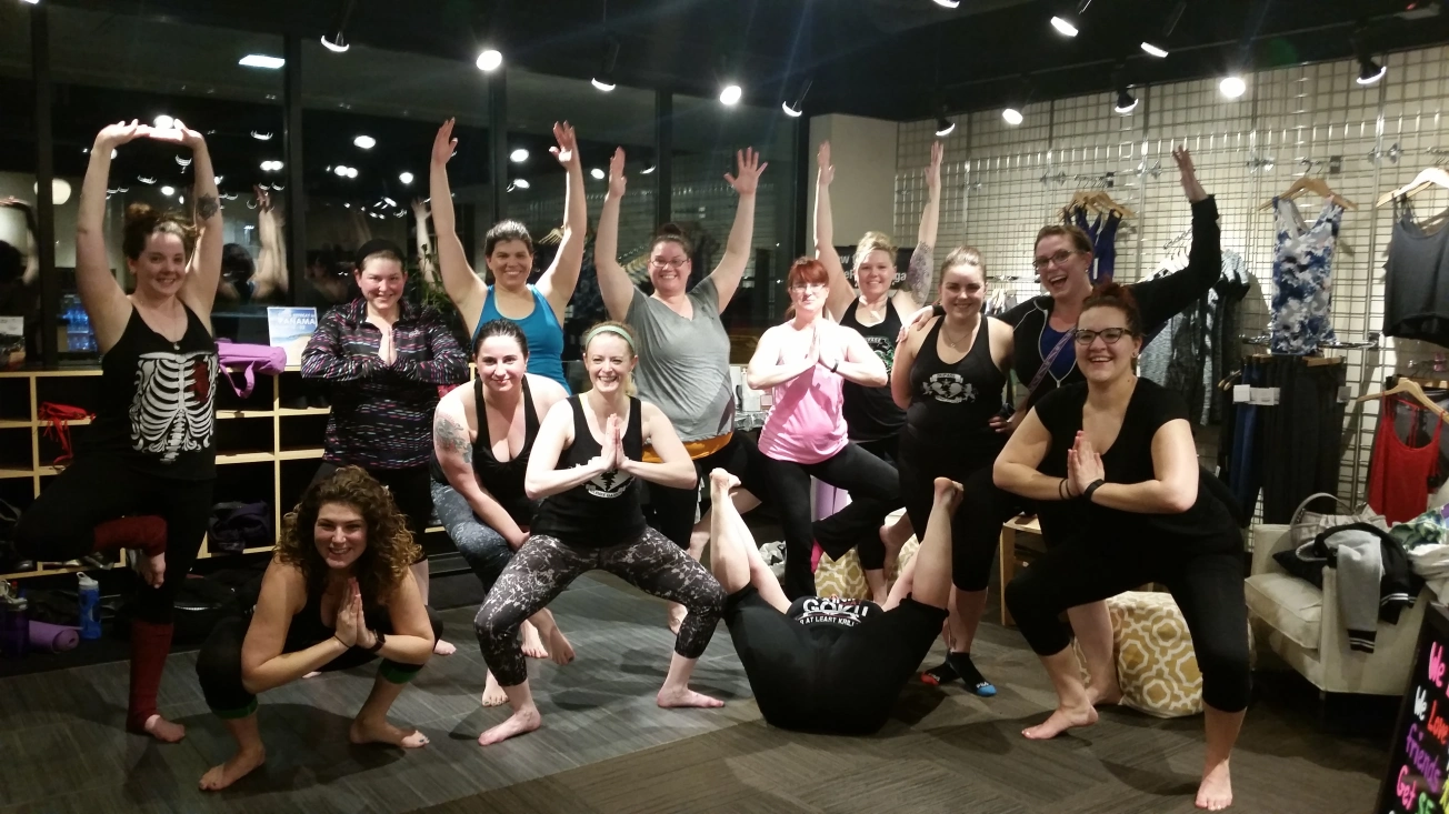 a woman's roller derby team after a yoga class