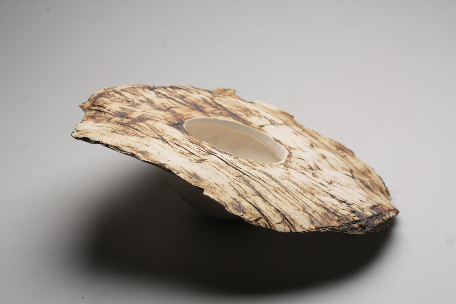 Abstract ceramic sculptural vessel with unique texture