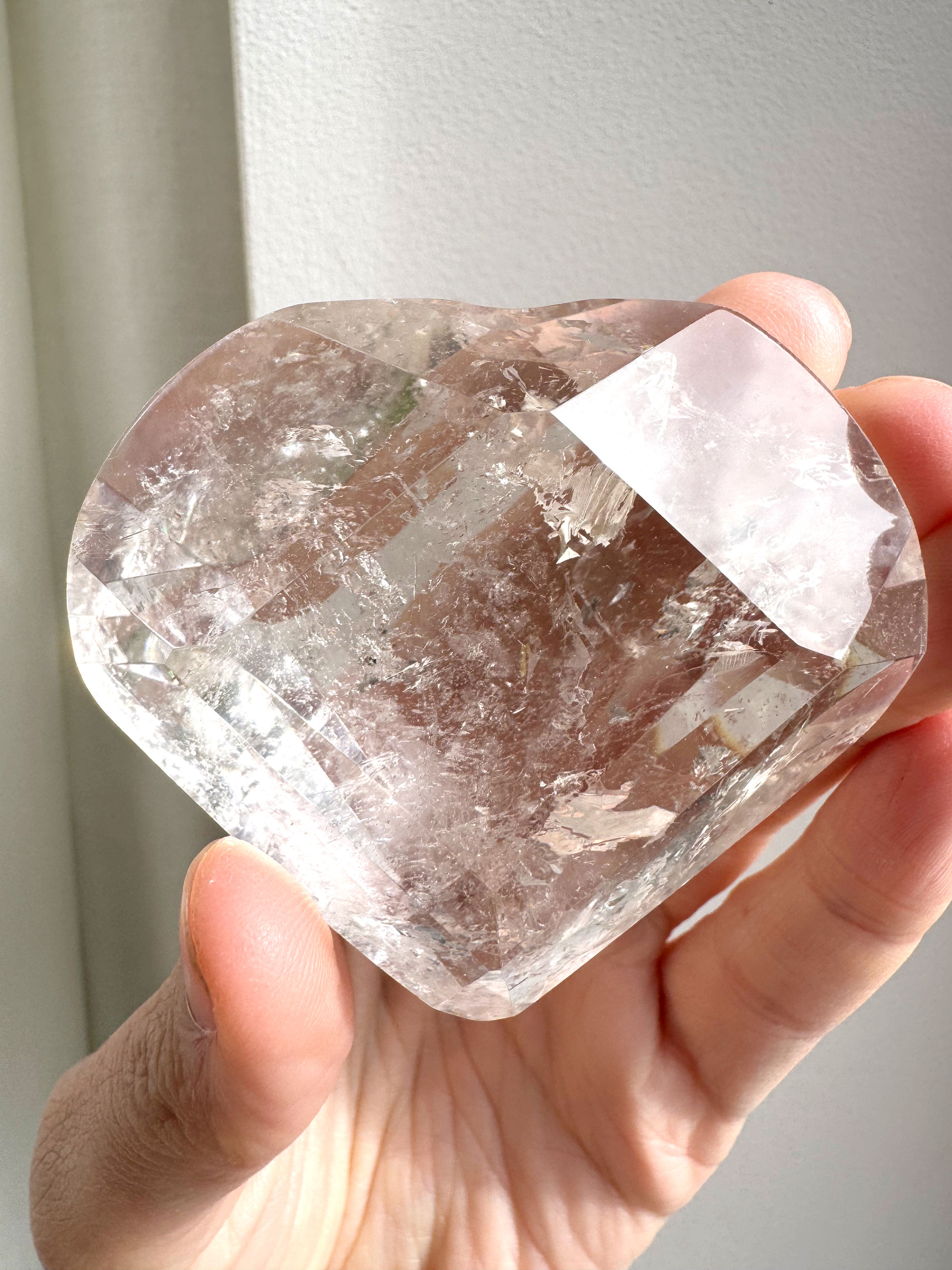 Lemurian hand carved Heart with rainbows