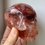 Thumbnail: Fire Quartz (Hematoid quartz) Hand carved Crystal skull