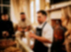 Private Chef Marcel introducing the menu in a warm, intimate setting.
