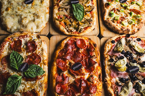 Cialdine con logo per pizzerie su pizze appena sfornate
