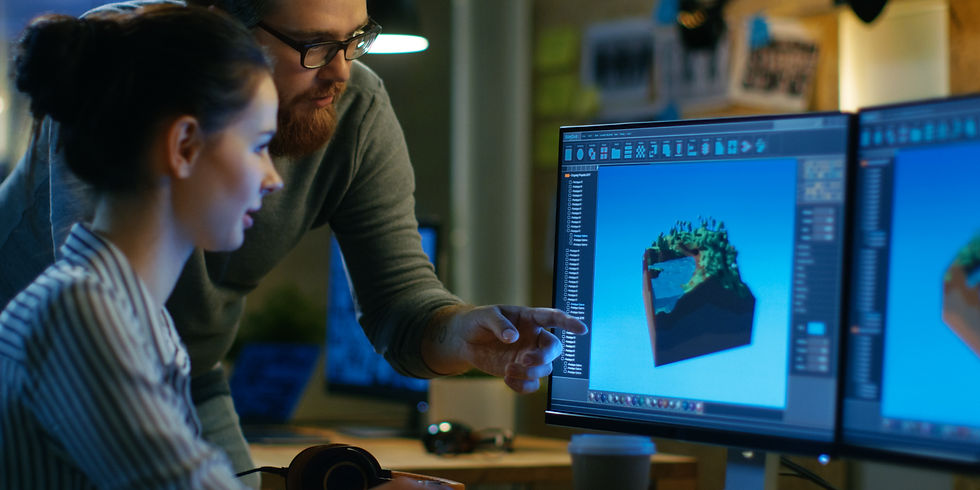 A designer working on a large monitor
