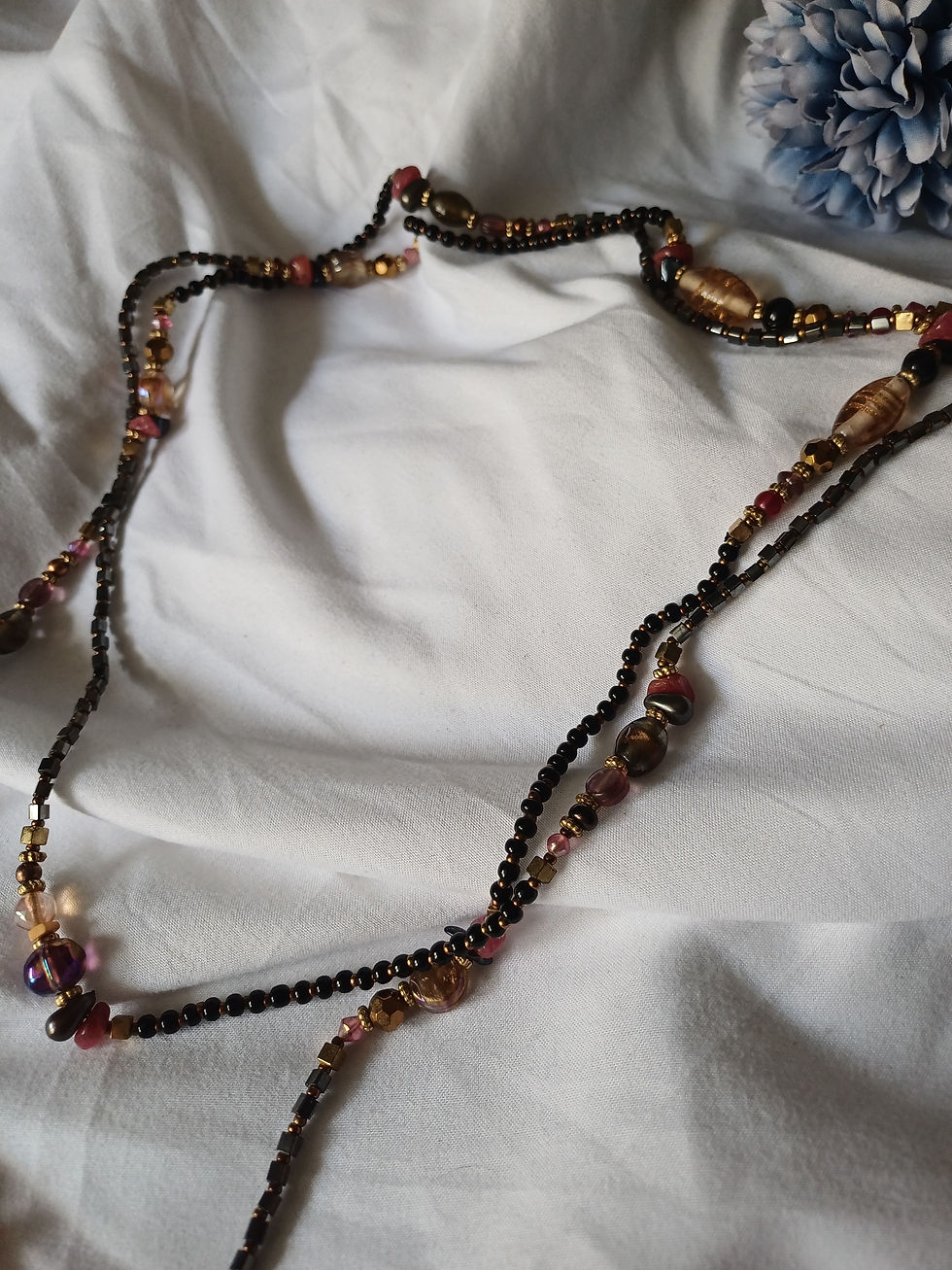 Thumbnail: Long layered black and gold beaded necklace