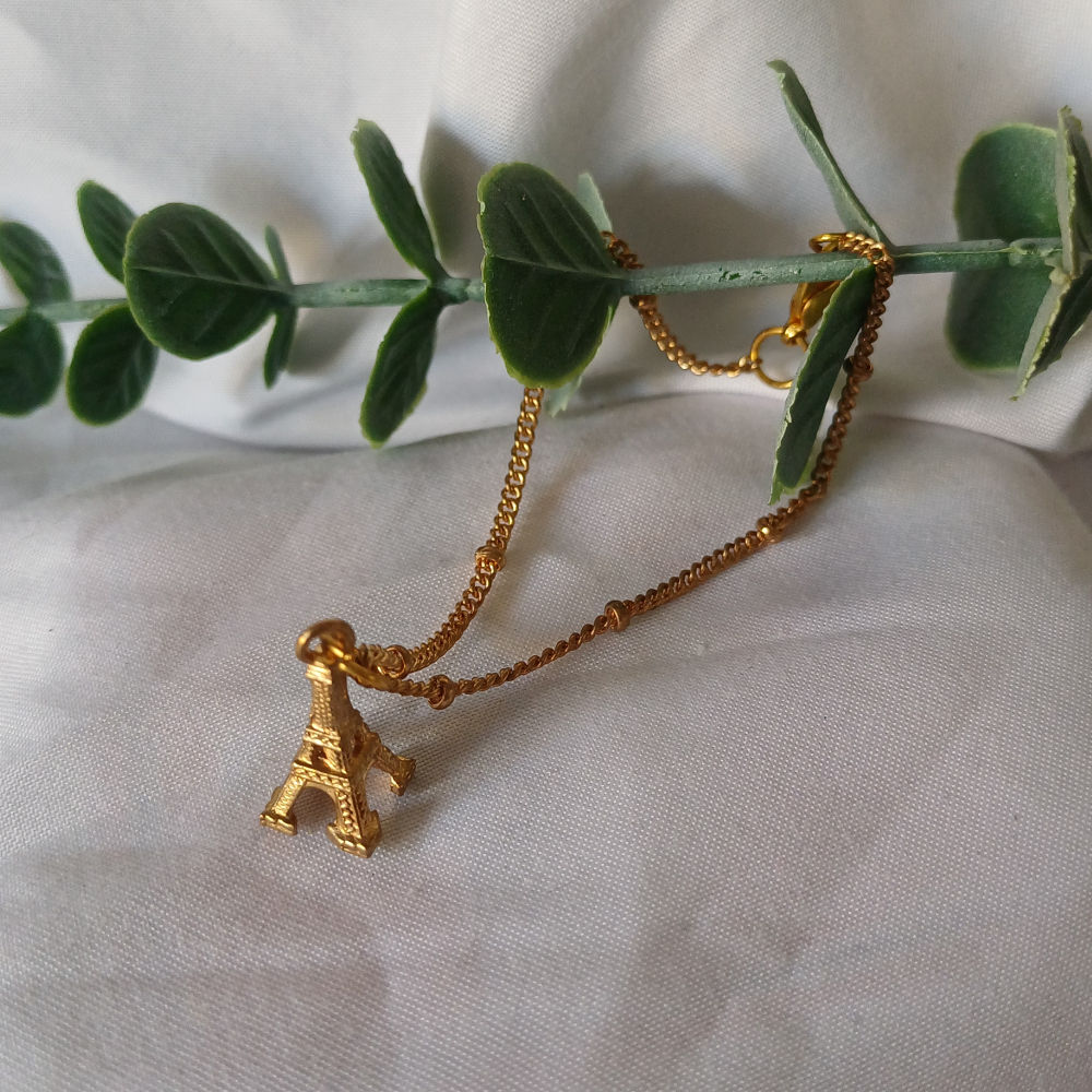 Gold Eiffel Tower charm bracelet